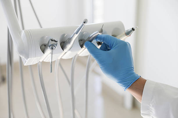 Professional Tooth Extraction technician working in Hardin County County, OH
